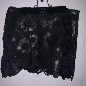 Forever 21- Black Floral leather mini skirt.